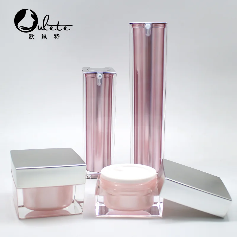 Oulete pink cosmetic bottle and jar with champagne-finish details